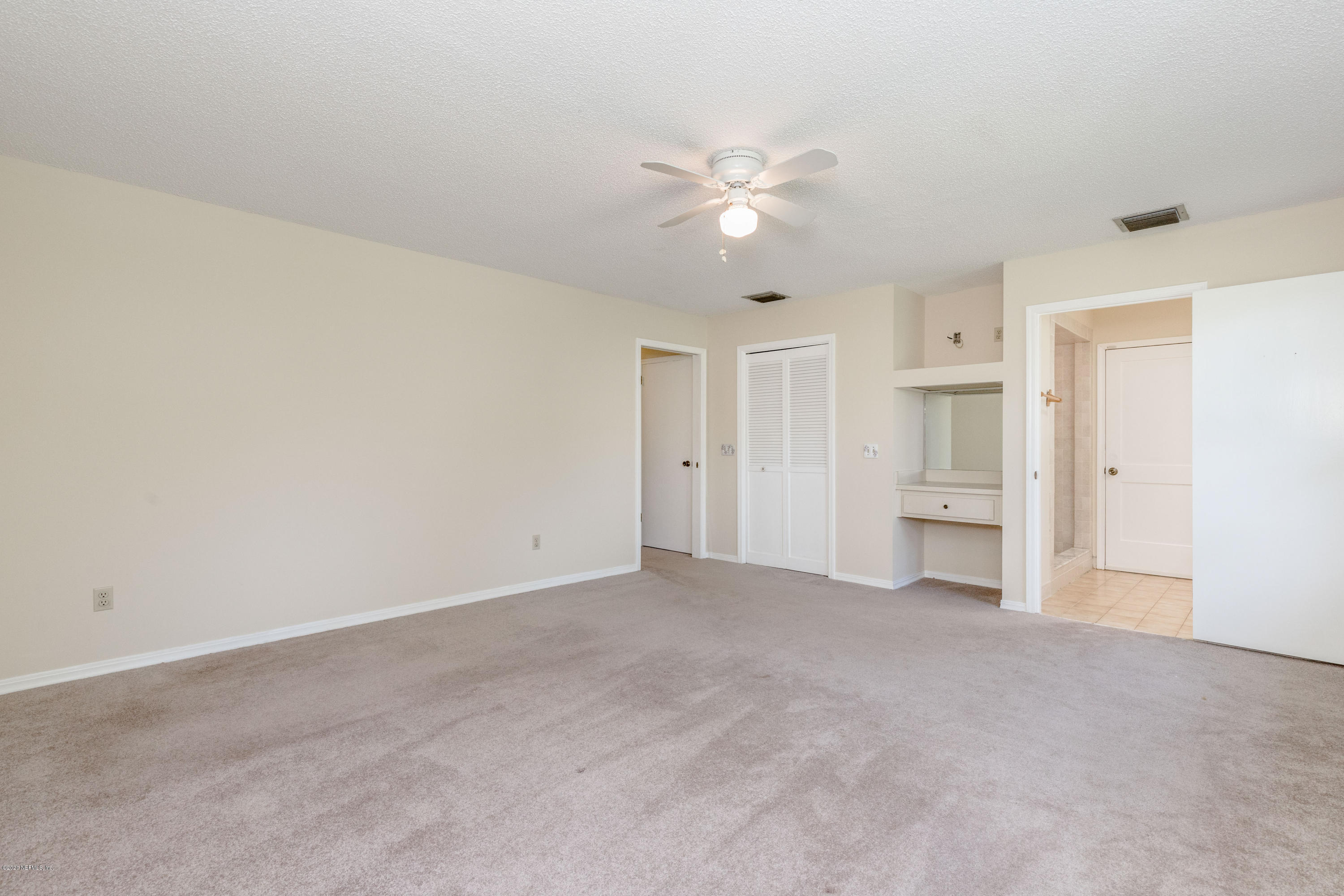 1704 Memory Lane Jacksonville, FL 32210 - Photo 16 of 54 an empty room with a bathroom