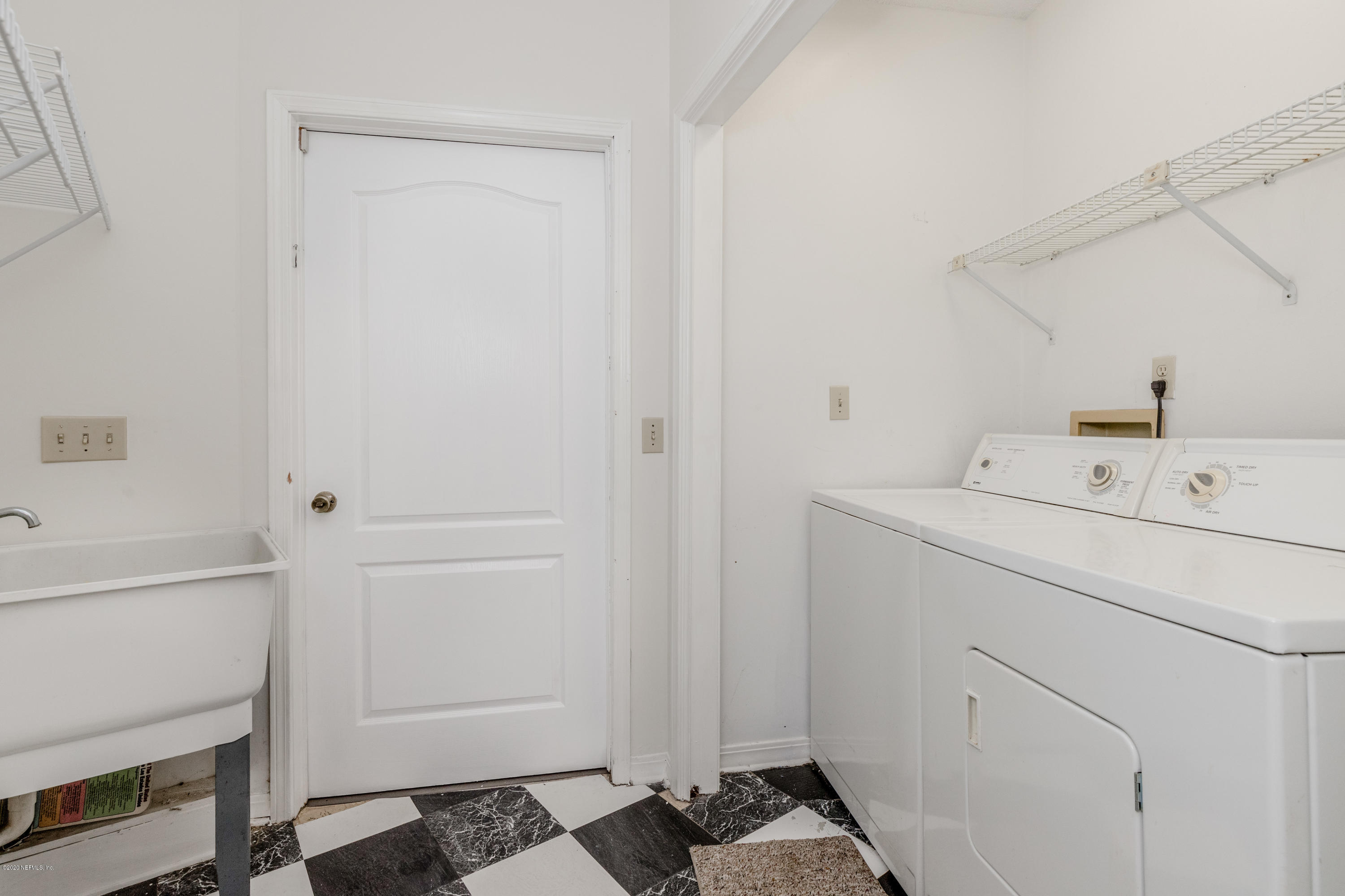 1704 Memory Lane Jacksonville, FL 32210 - Photo 25 of 54 a utility room with dryer and washer