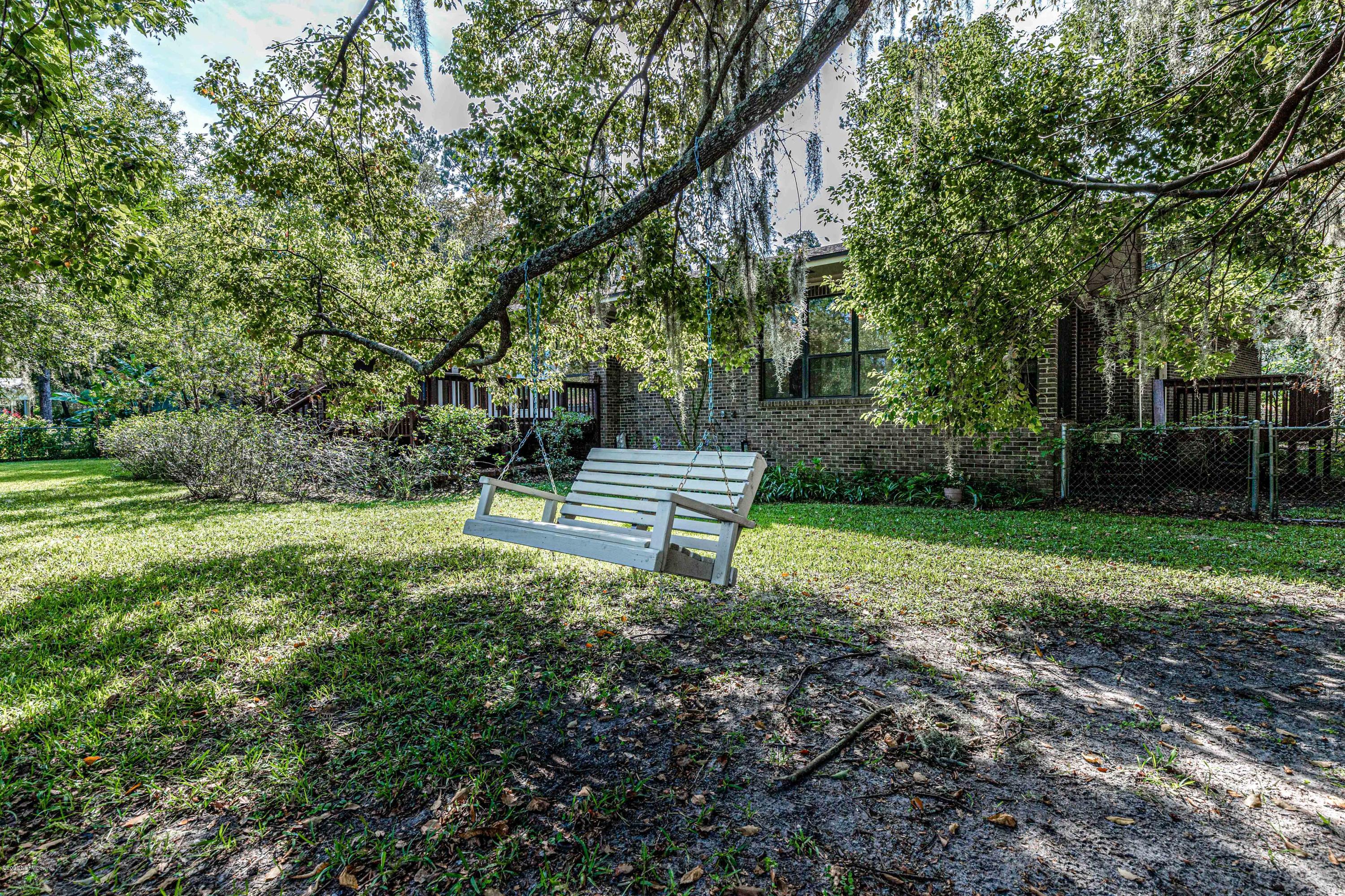 1704 Memory Lane Jacksonville, FL 32210 - Photo 34 of 54 a garden view with a seating space