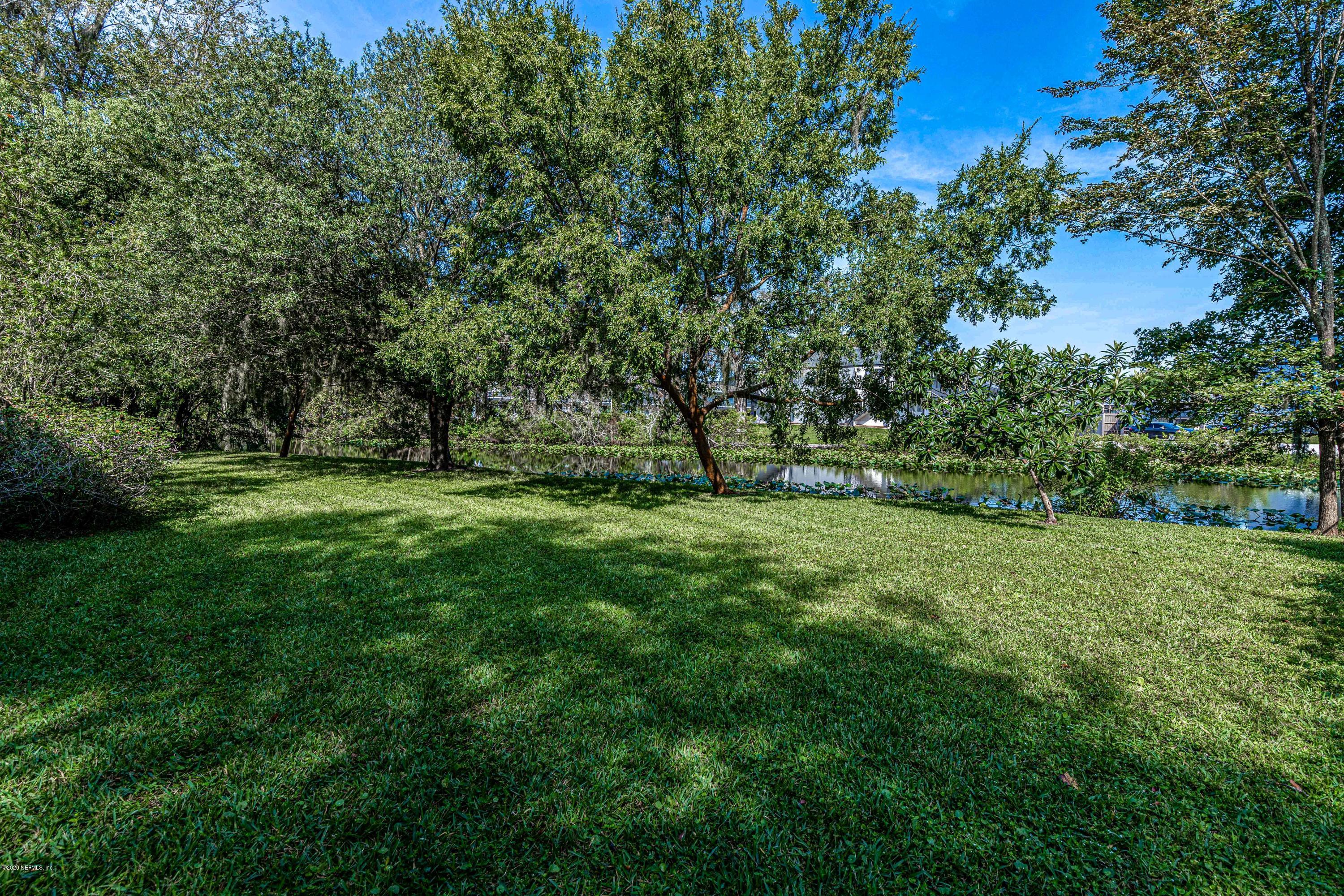 1704 Memory Lane Jacksonville, FL 32210 - Photo 35 of 54 a view of outdoor space with deck and yard