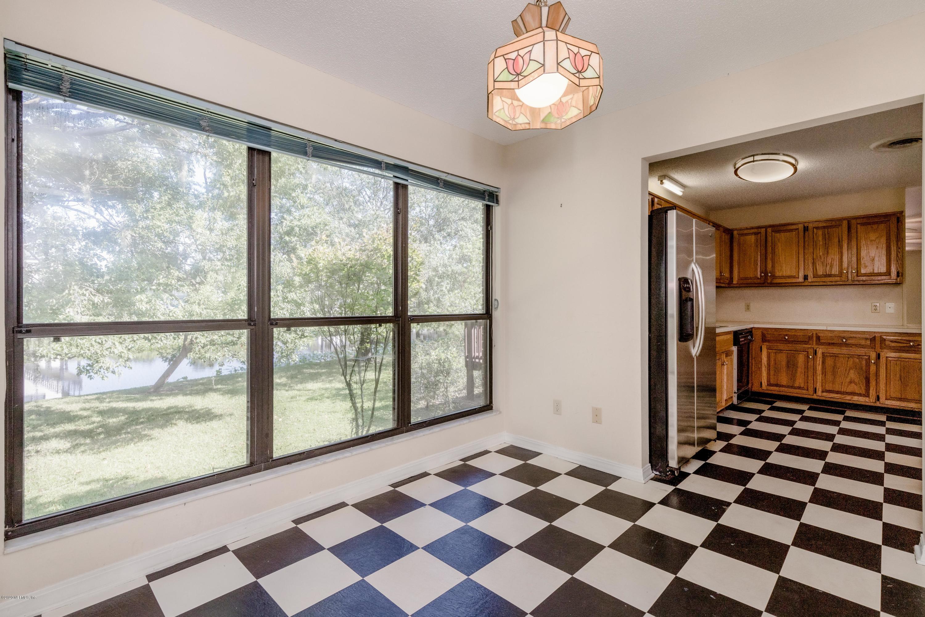 1704 Memory Lane Jacksonville, FL 32210 - Photo 39 of 54 a view of a room with a black and white checkered floor
