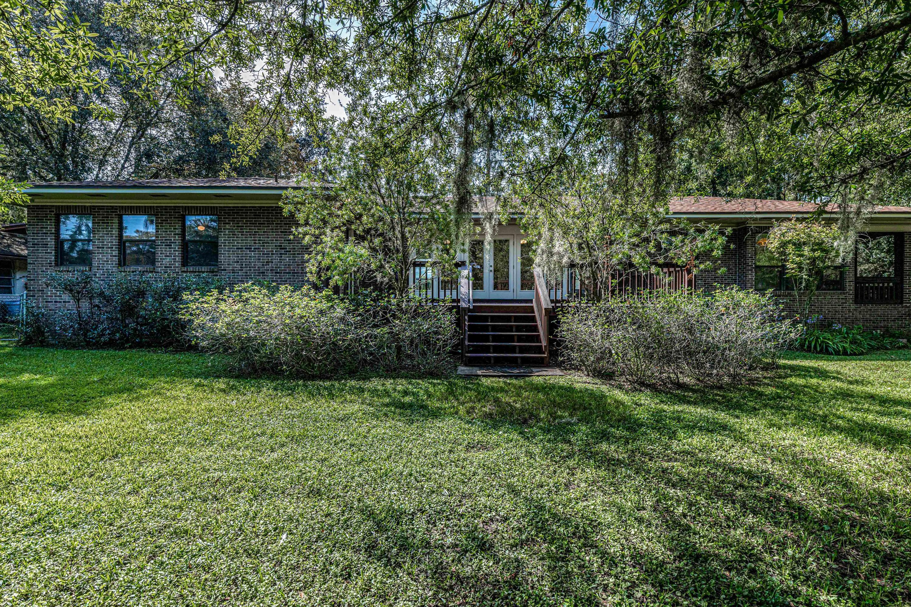 1704 Memory Lane Jacksonville, FL 32210 - Photo 45 of 54 a view of house with yard and entertaining space