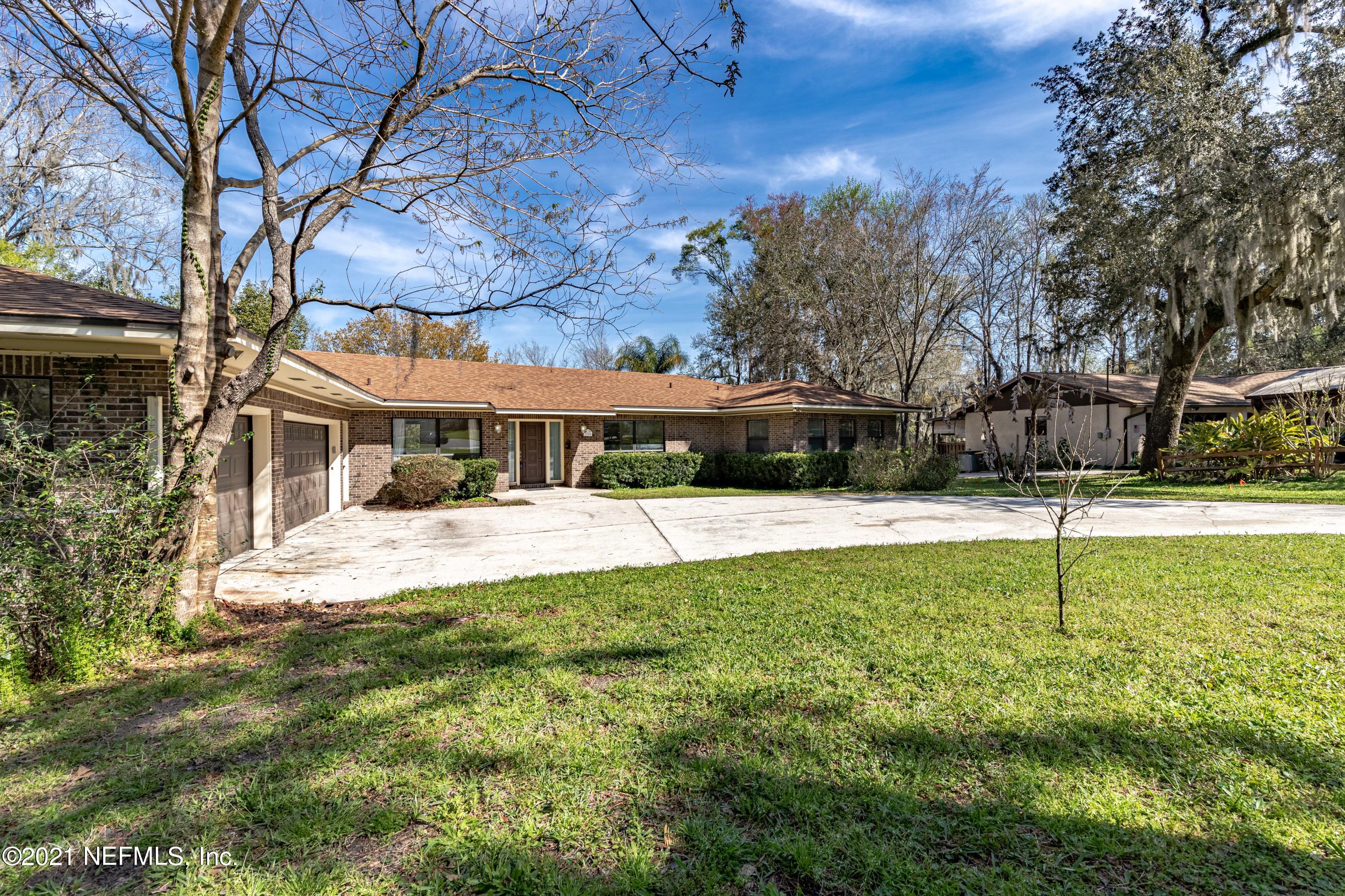 1704 Memory Lane Jacksonville, FL 32210 - Photo 52 of 54 a view of house with yard and sitting area