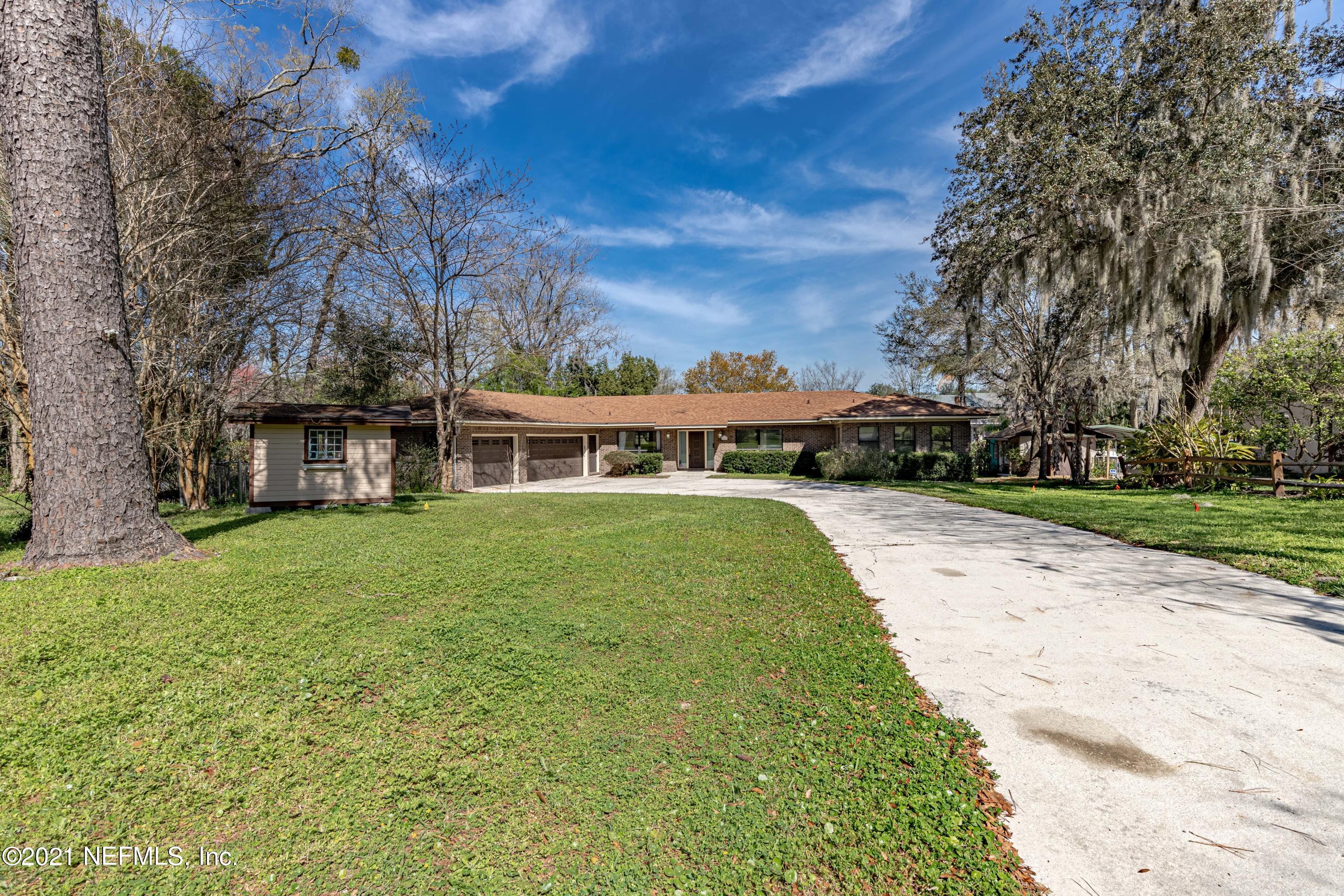 1704 Memory Lane Jacksonville, FL 32210 - Photo 53 of 54 a view of a house with a yard