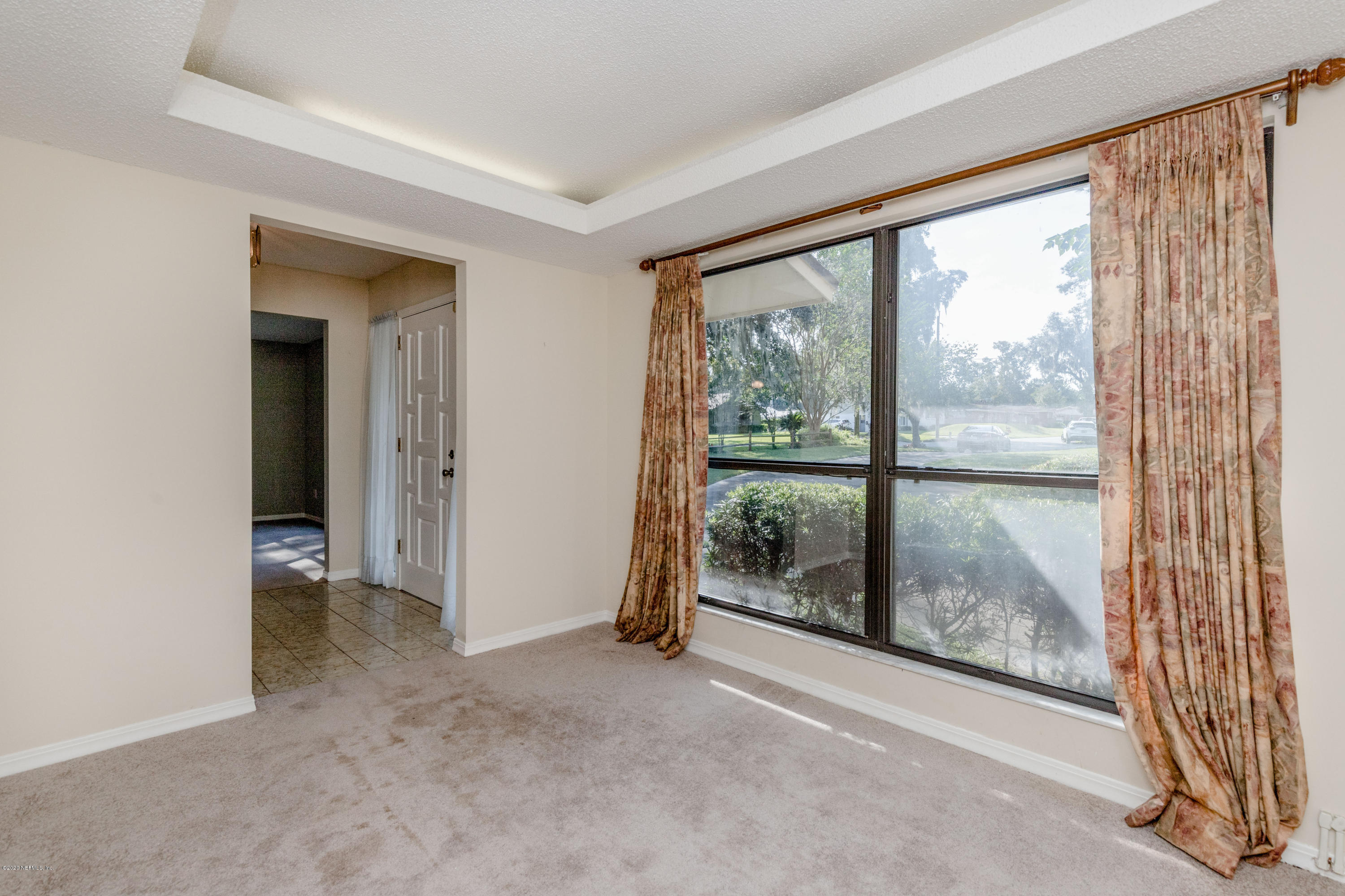 1704 Memory Lane Jacksonville, FL 32210 - Photo 10 of 54 a view of a room with sliding glass door and balcony