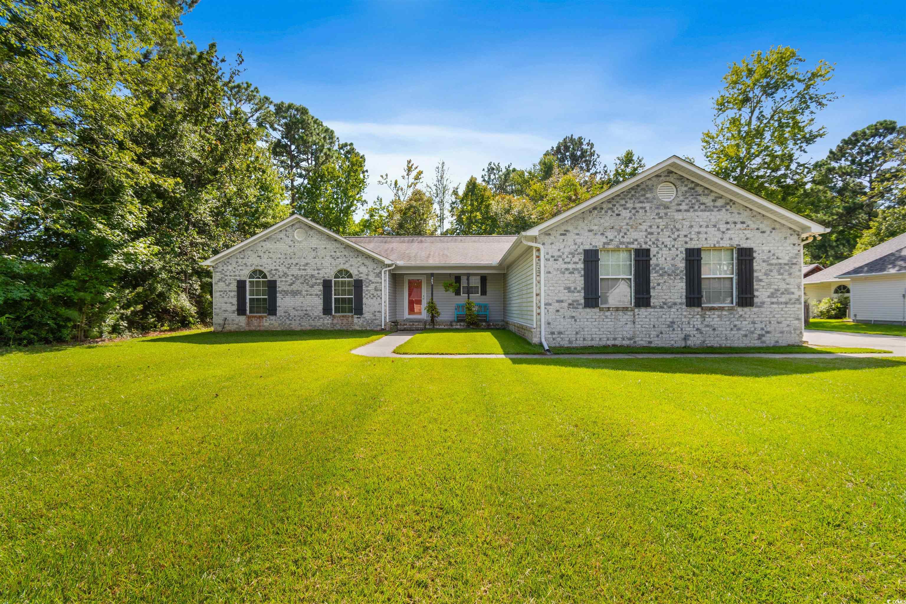 203 Prestwick Road Myrtle Beach, SC 29588 - Photo 1 of 34 Single story home featuring a front yard