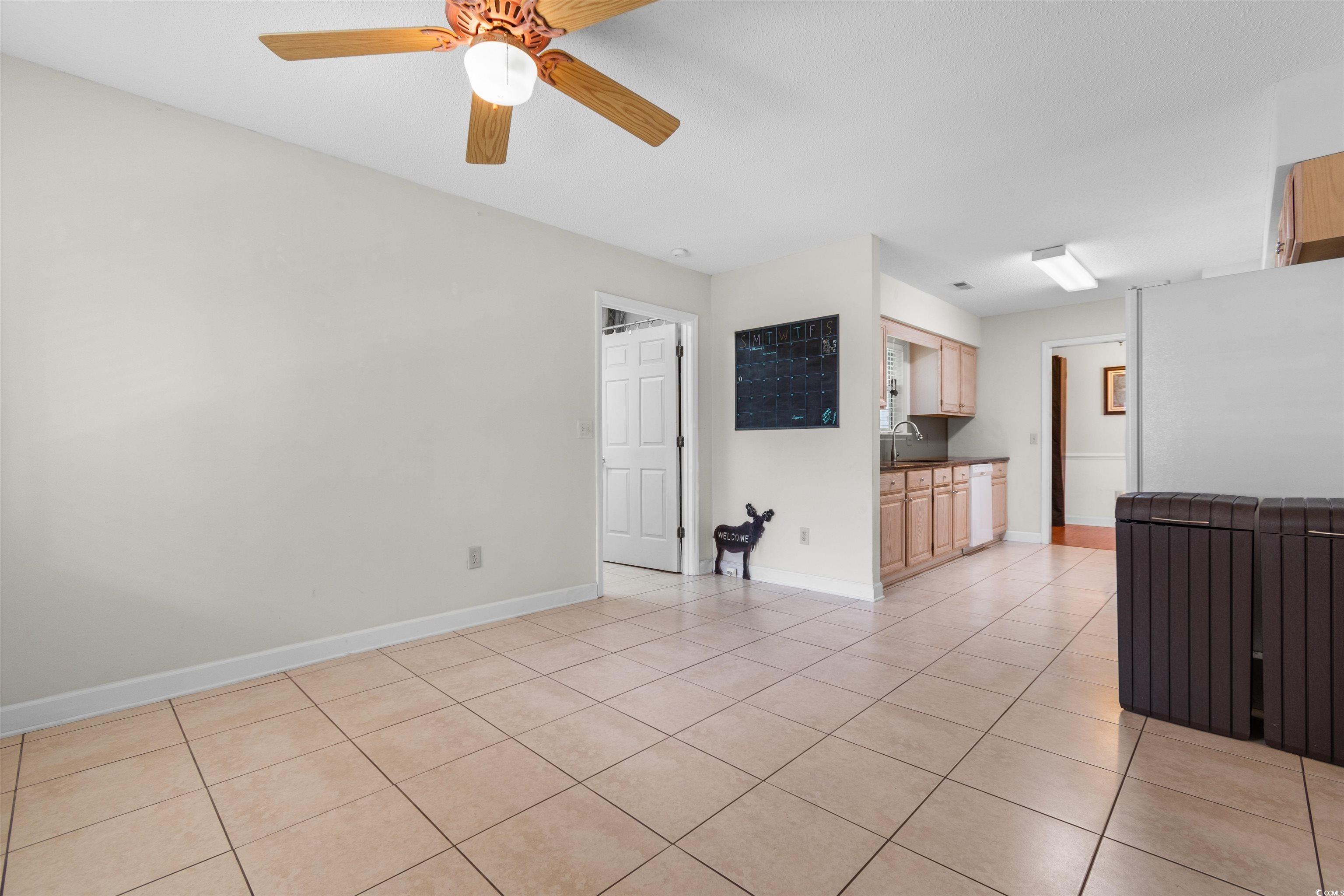 203 Prestwick Road Myrtle Beach, SC 29588 - Photo 11 of 34 Empty room featuring a textured ceiling, plenty of