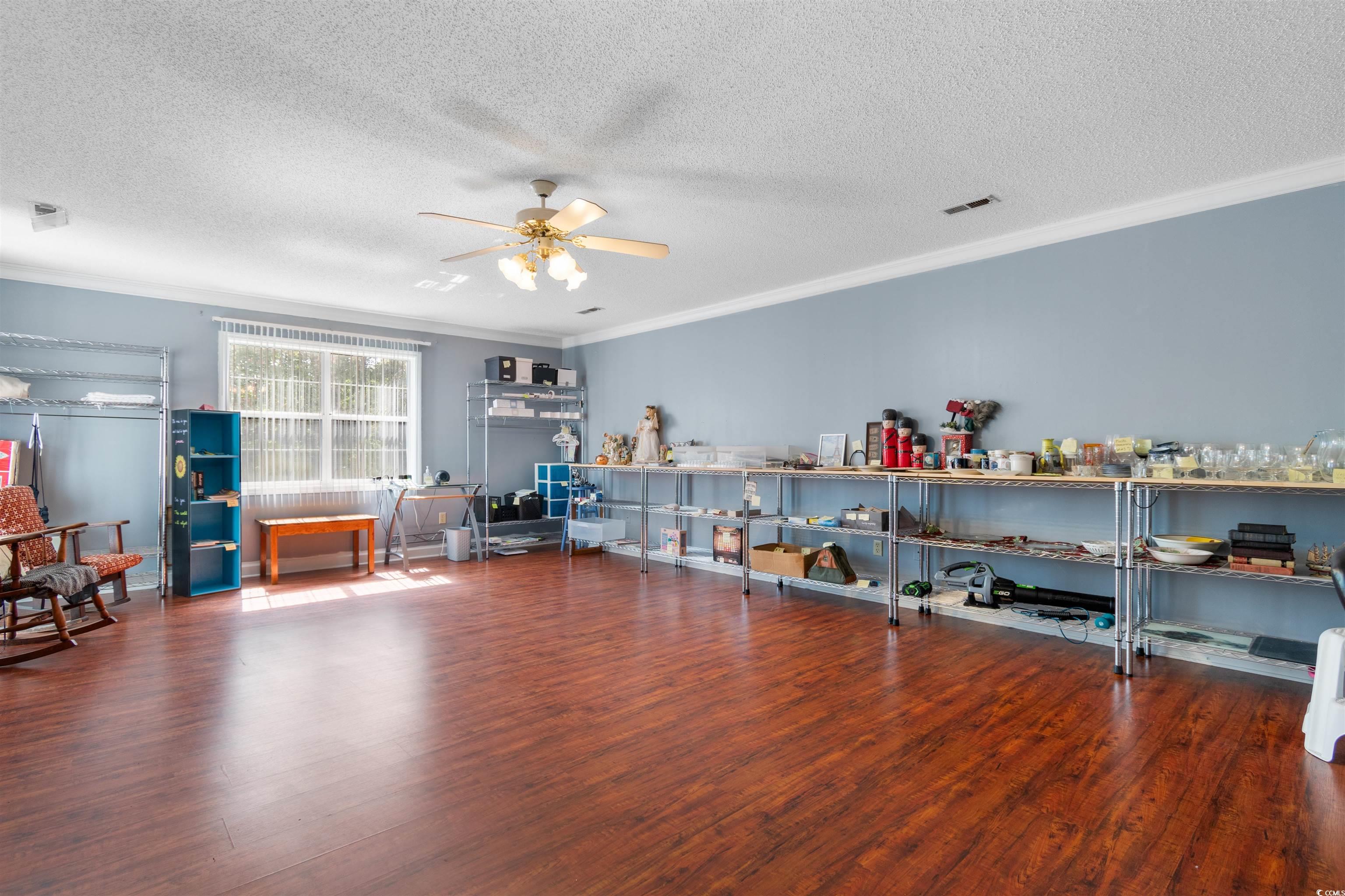 203 Prestwick Road Myrtle Beach, SC 29588 - Photo 12 of 34 Unfurnished living room featuring sink, light tile