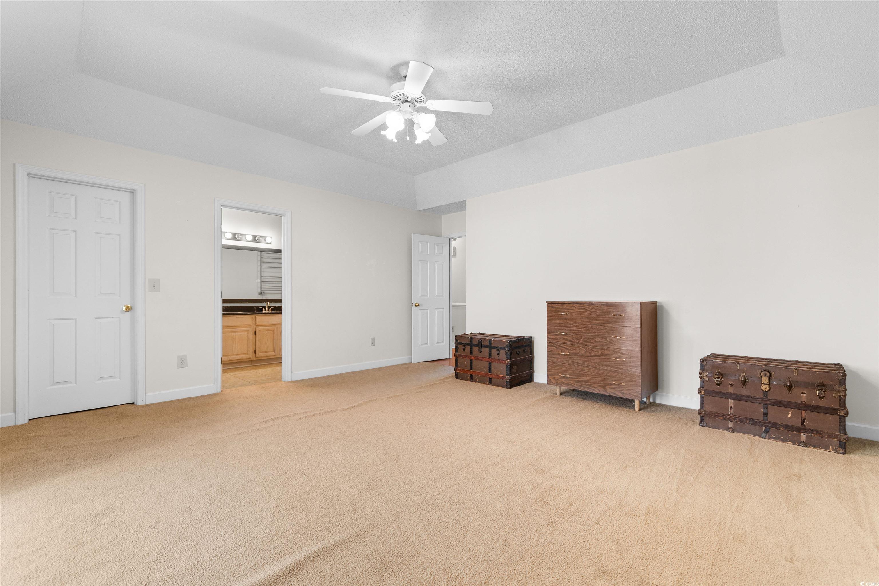 203 Prestwick Road Myrtle Beach, SC 29588 - Photo 14 of 34 Interior space featuring ceiling fan, dark hardwoo