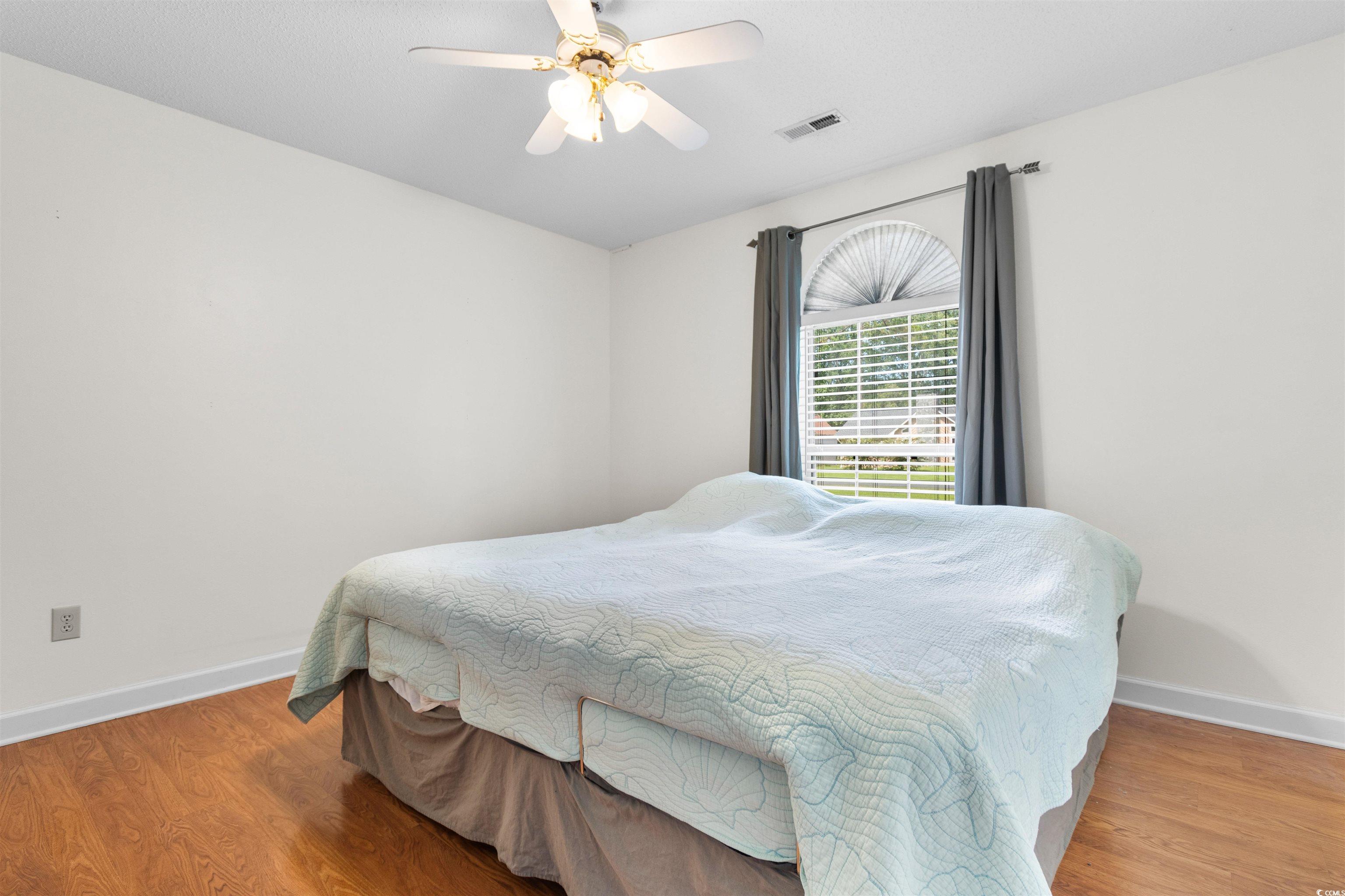 203 Prestwick Road Myrtle Beach, SC 29588 - Photo 19 of 34 Living area featuring ceiling fan, plenty of natur