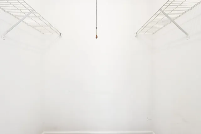 a view of small space with white door