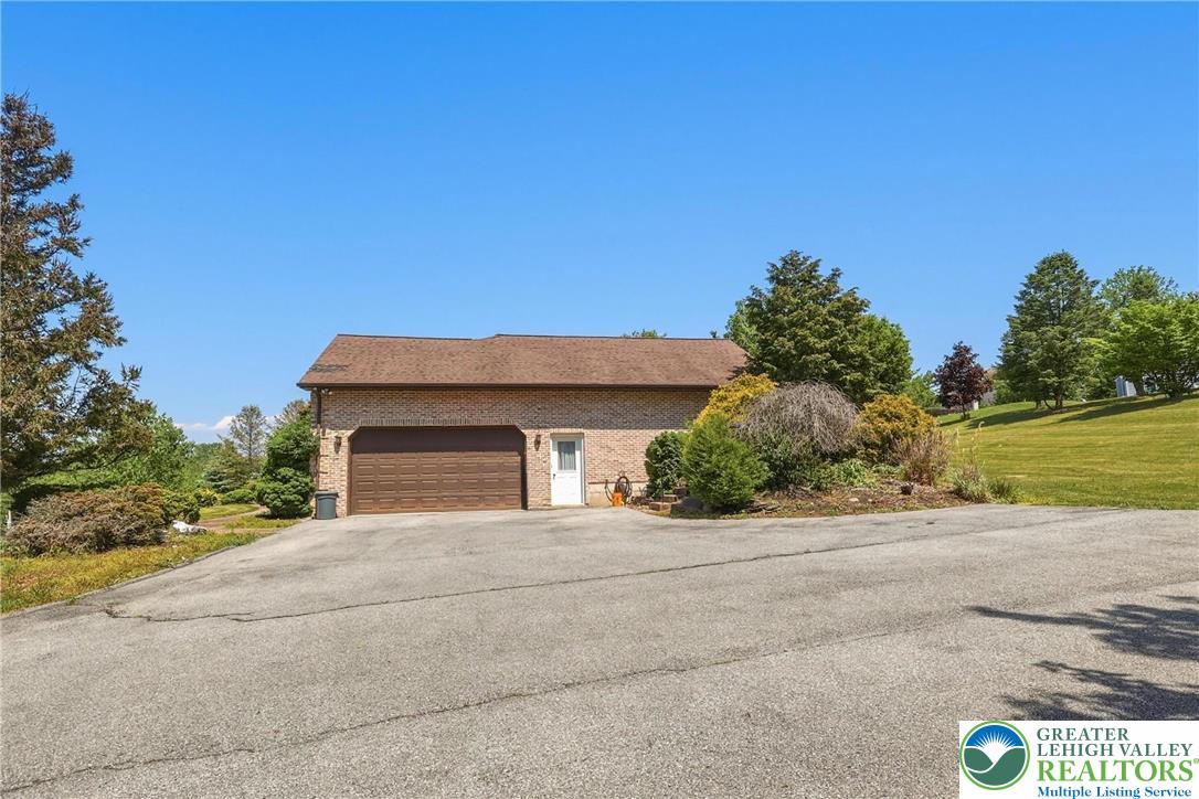 5217 Cider Press Road Schnecksville, PA 18078 - Photo 50 of 54 front view of a house with a street