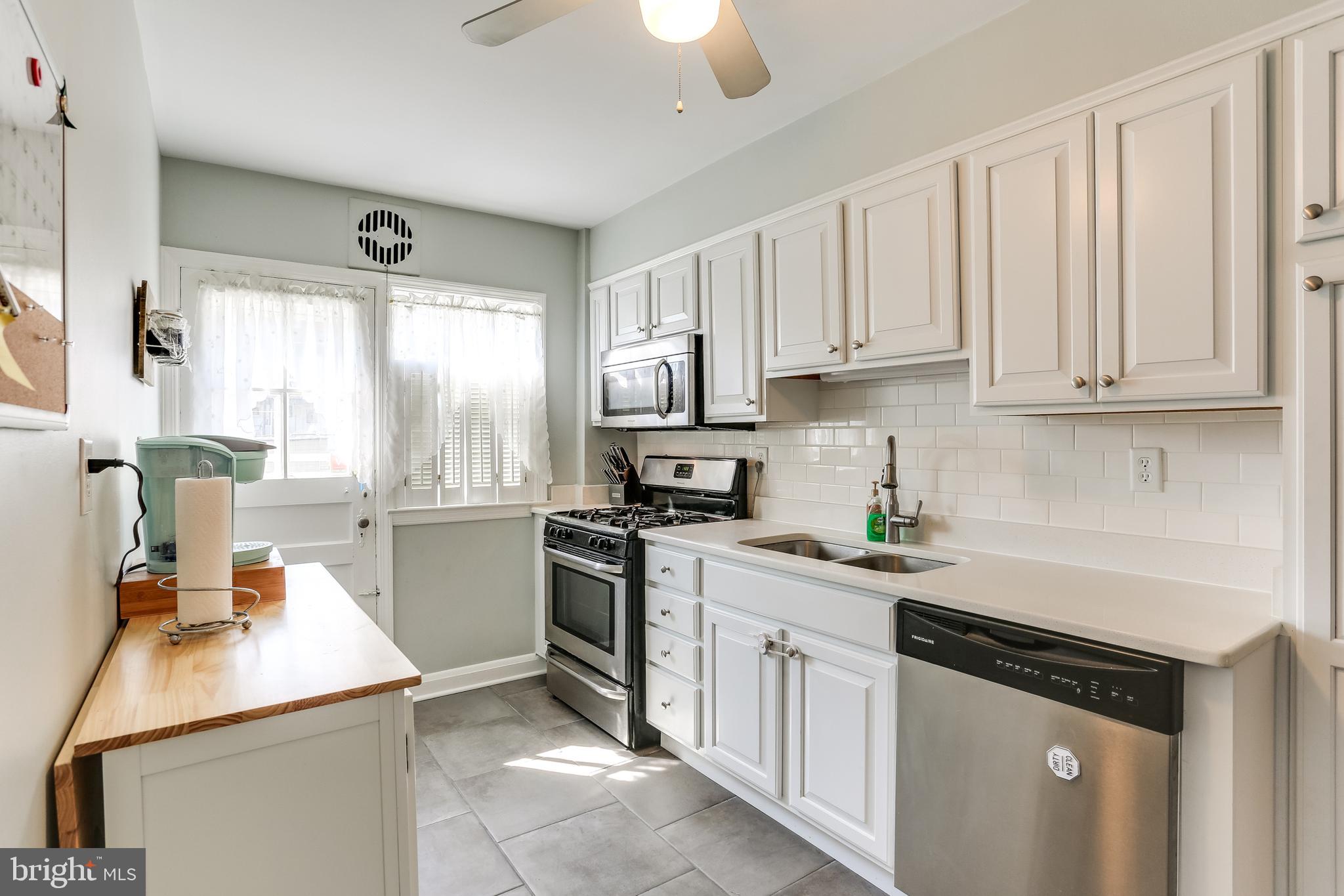 402 Stratford Road Baltimore, MD 21228 - Photo 8 of 25 Remodeled Kitchen w/SS appliances
