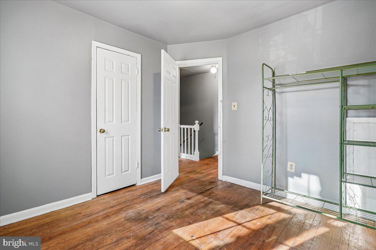 2015 38th Street Southeast, Unit B Washington, DC 20020 - Photo 26 of 30 a view of a room with wooden floor and bathroom