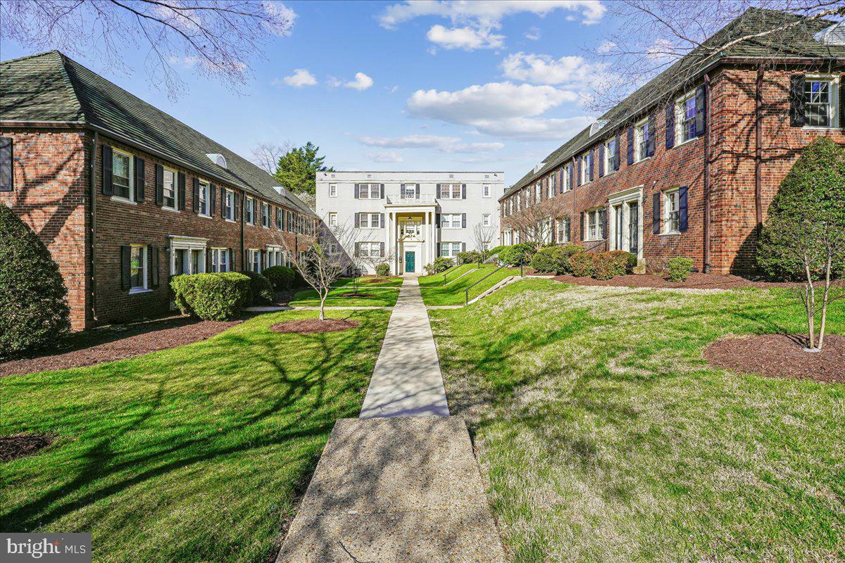 2015 38th Street Southeast, Unit B Washington, DC 20020 - Photo 28 of 30 a view of a big building with many windows
