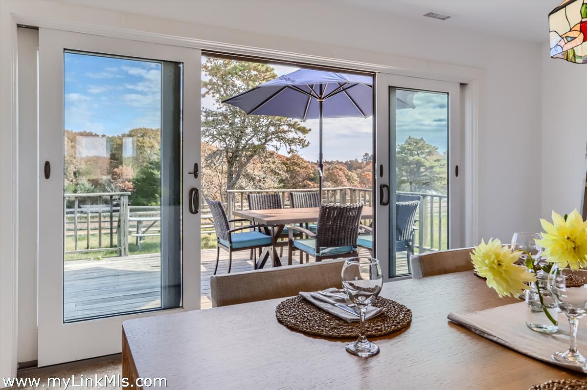 104 Pond View Farm Road West Tisbury, MA 02568 - Photo 10 of 47 Dining room with doors to the deck