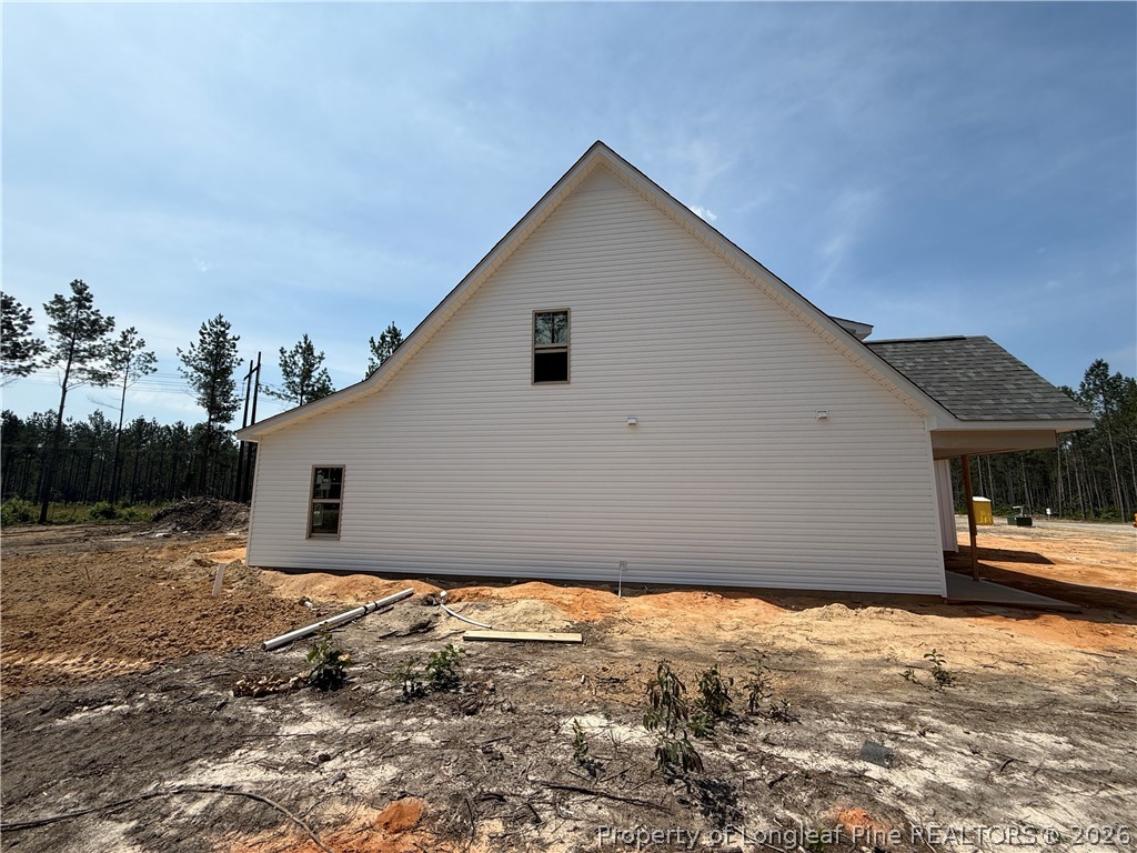 215 Whispering Ridge West End, NC 27376 - Photo 14 of 19 side of home