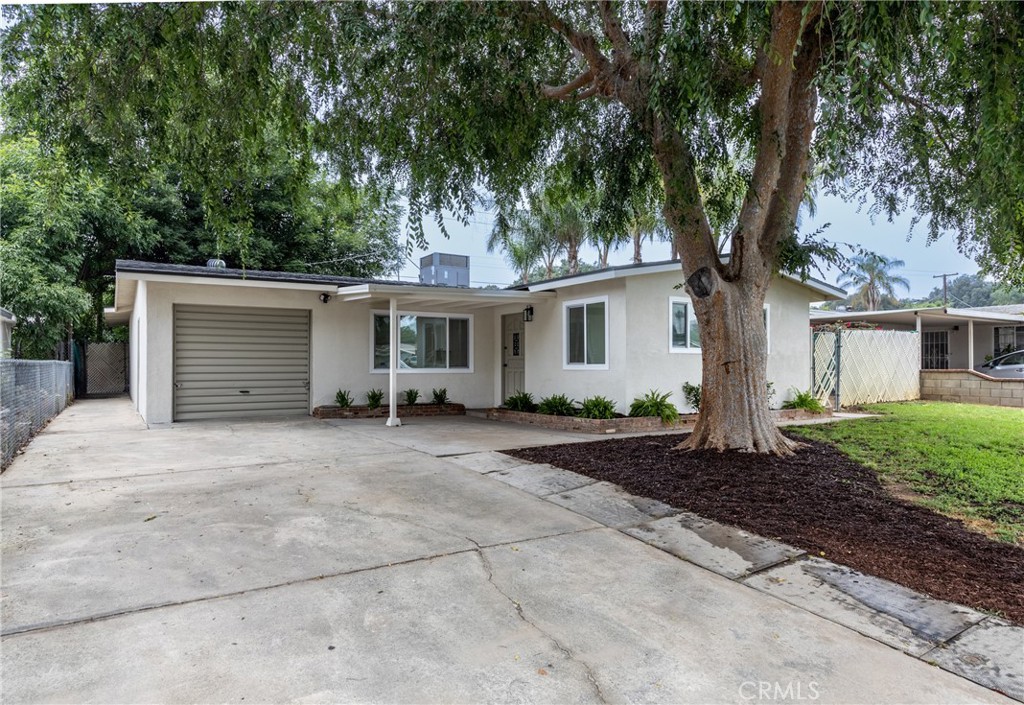 3973 Overland Street Riverside, CA 92503 - Photo 1 of 1 front view of a house with a yard