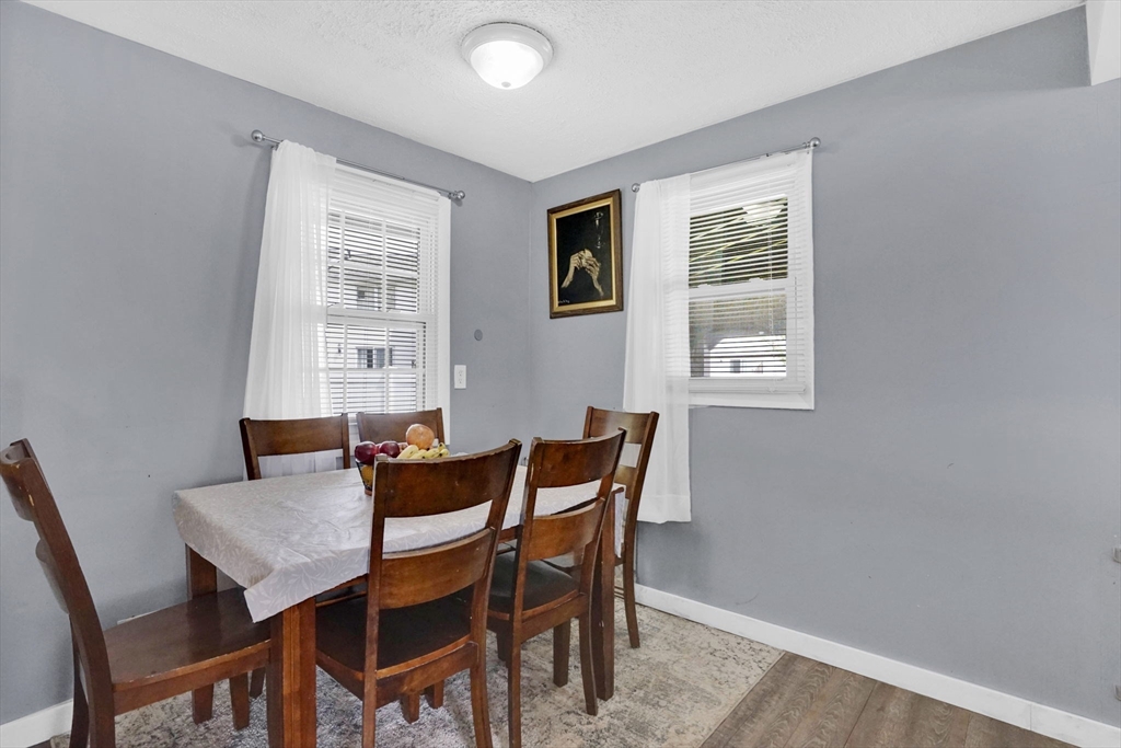 94 Cora Avenue Chicopee, MA 01013 - Photo 14 of 41 a dining room with furniture and window