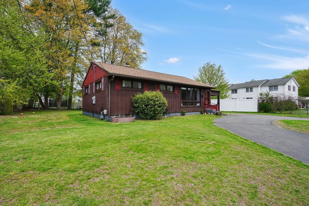 94 Cora Avenue Chicopee, MA 01013 - Photo 2 of 41 a view of a house with a yard