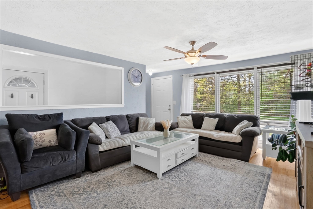 94 Cora Avenue Chicopee, MA 01013 - Photo 21 of 41 a living room with furniture and a large window