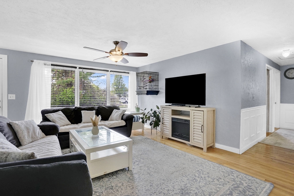 94 Cora Avenue Chicopee, MA 01013 - Photo 22 of 41 a living room with furniture and a flat screen tv
