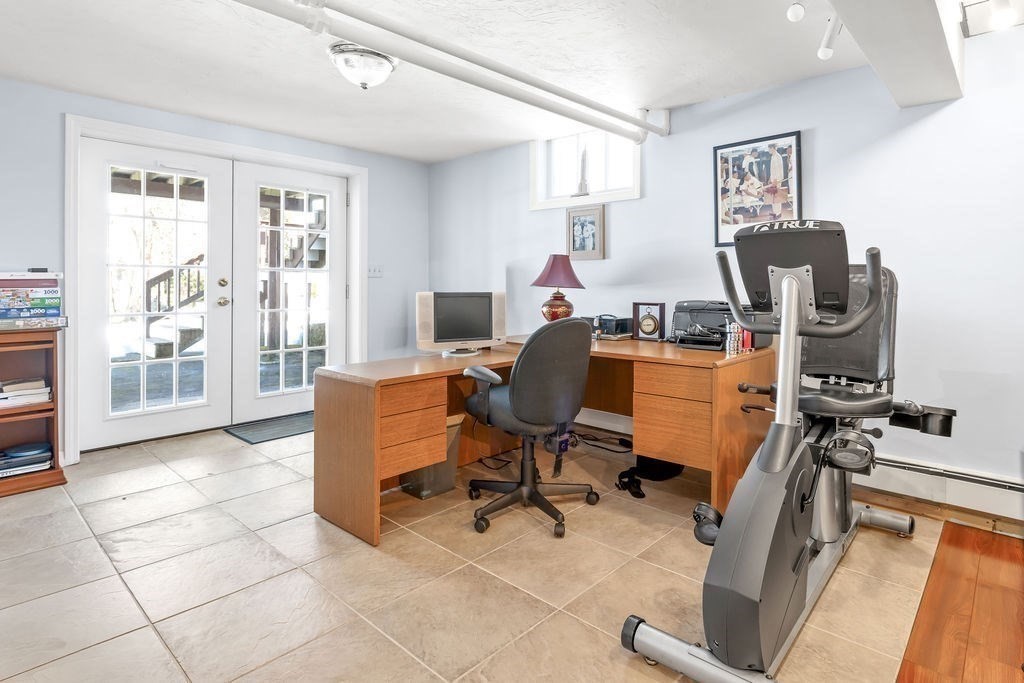 60 High Street Needham, MA 02494 - Photo 27 of 32 a view of a workspace with furniture and a window