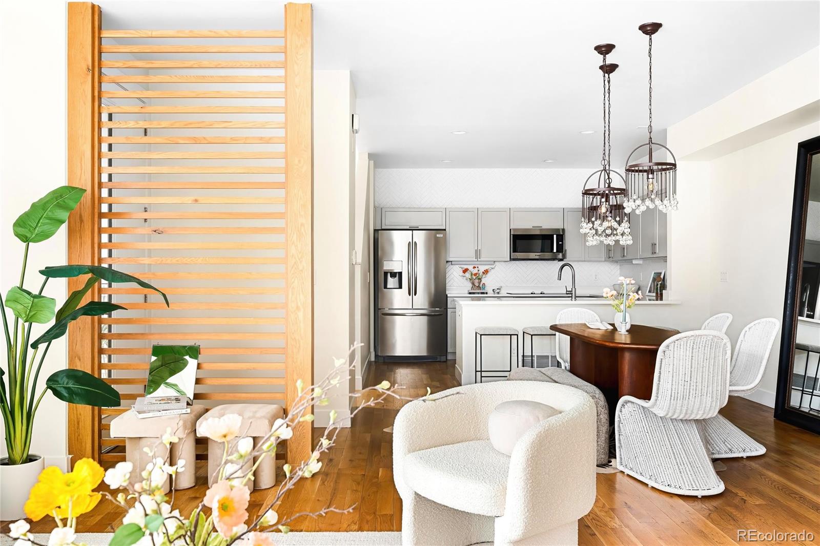 3166 Vallejo Street Denver, CO 80211 - Photo 3 of 50 a dining room with furniture a window and kitchen view
