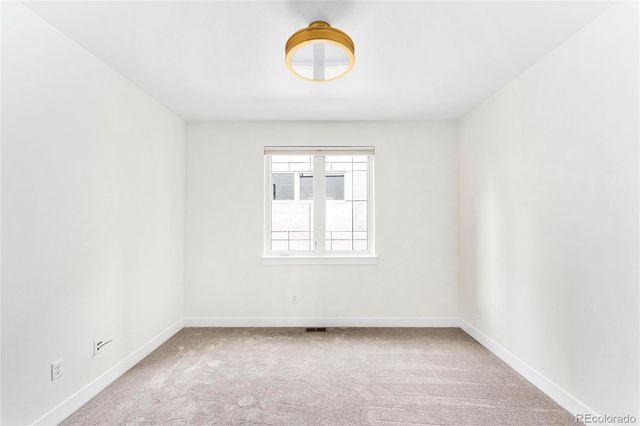 a view of a room that has a window