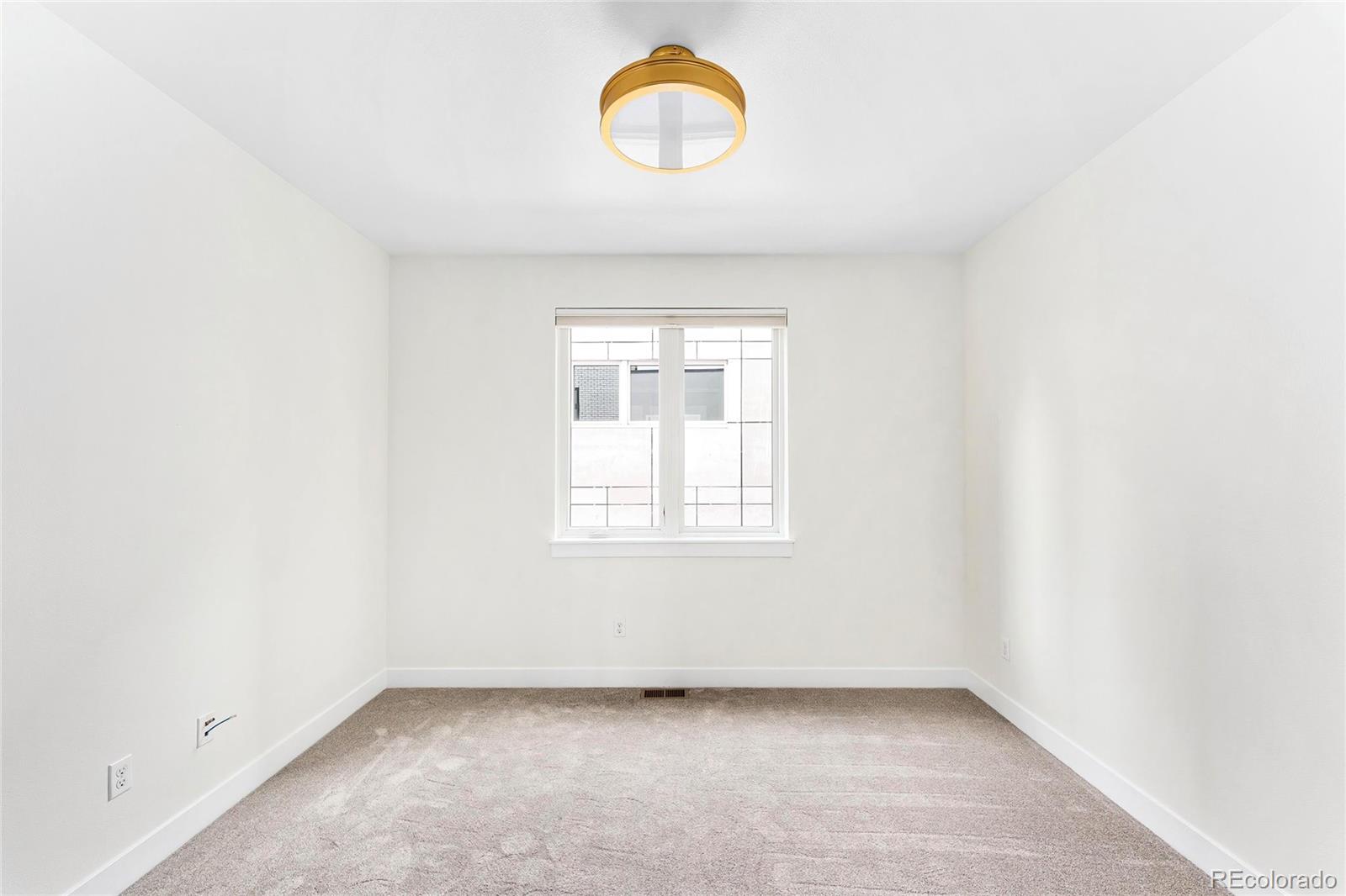 3166 Vallejo Street Denver, CO 80211 - Photo 32 of 50 a view of a room that has a window