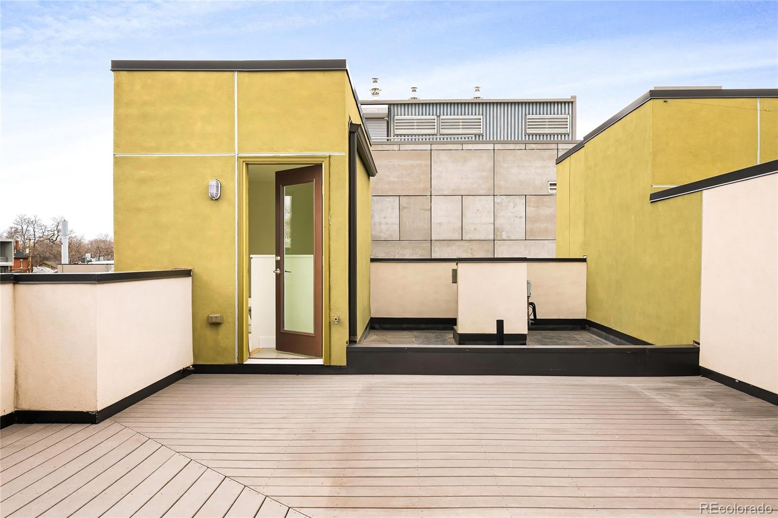 3166 Vallejo Street Denver, CO 80211 - Photo 35 of 50 a living room with a wooden floor and a table