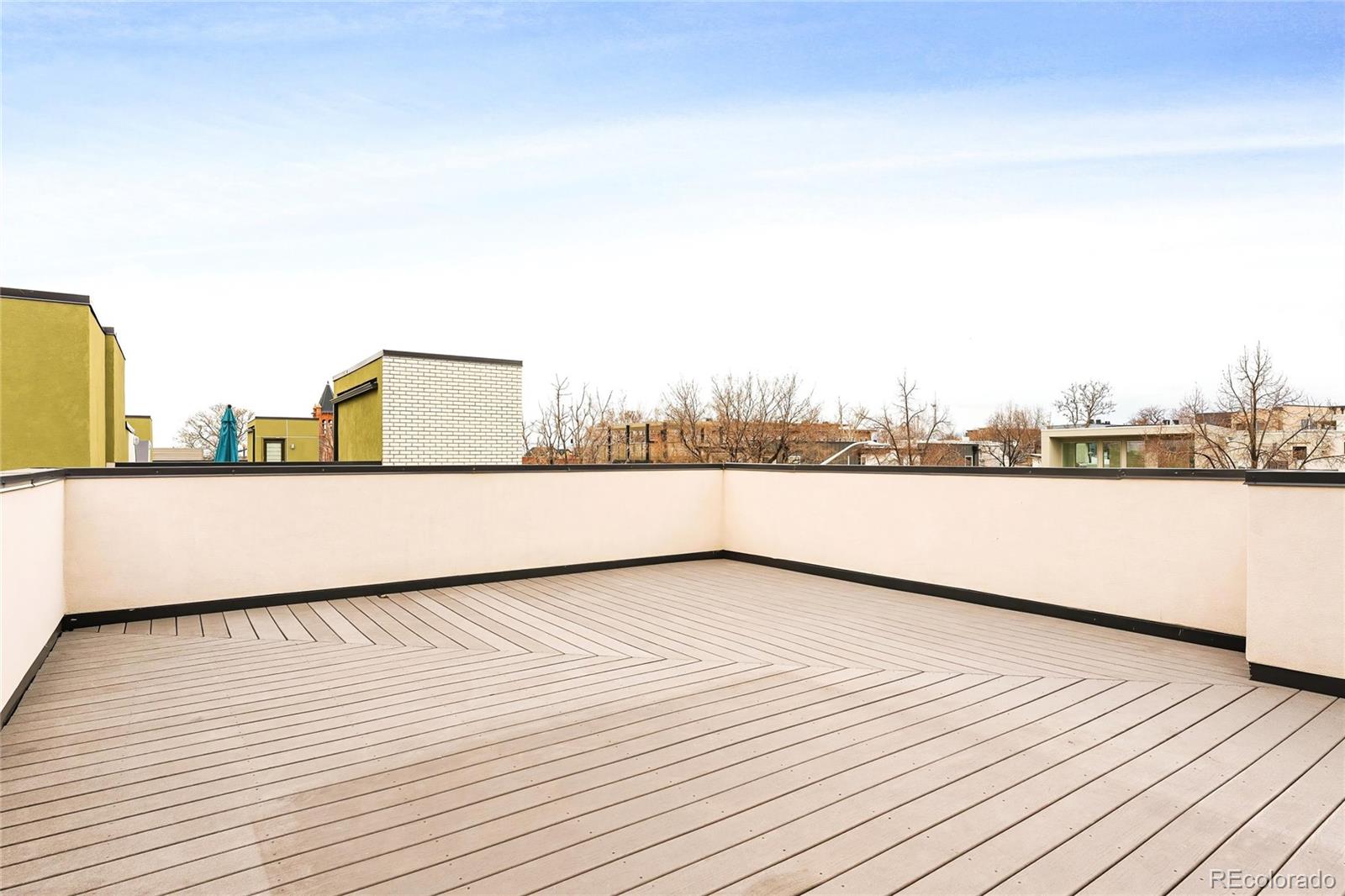 3166 Vallejo Street Denver, CO 80211 - Photo 37 of 50 a view of a terrace with skyline