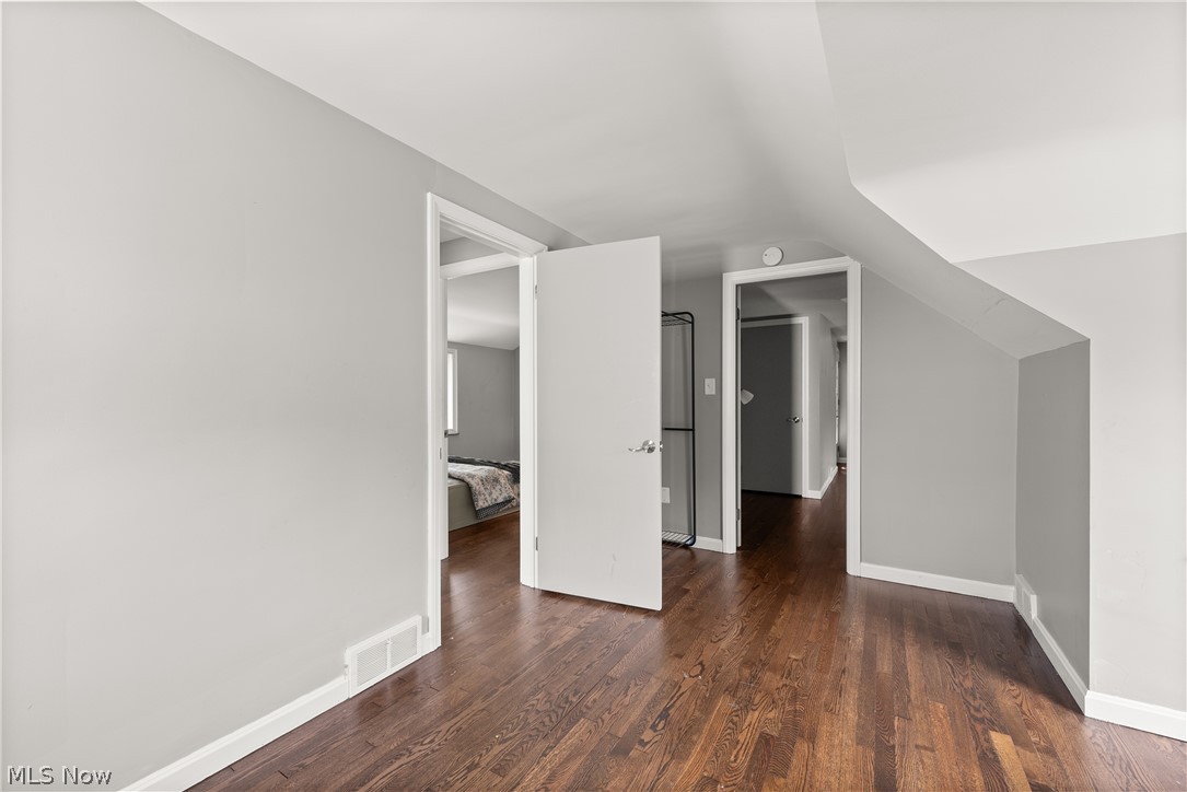 21779 Eaton Road Cleveland, OH 44126 - Photo 24 of 46 Additional living space featuring dark hardwood / wood-style flooring and lofted ceiling