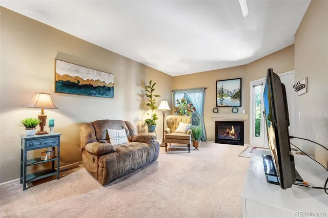 a kitchen with a sink appliances and cabinets