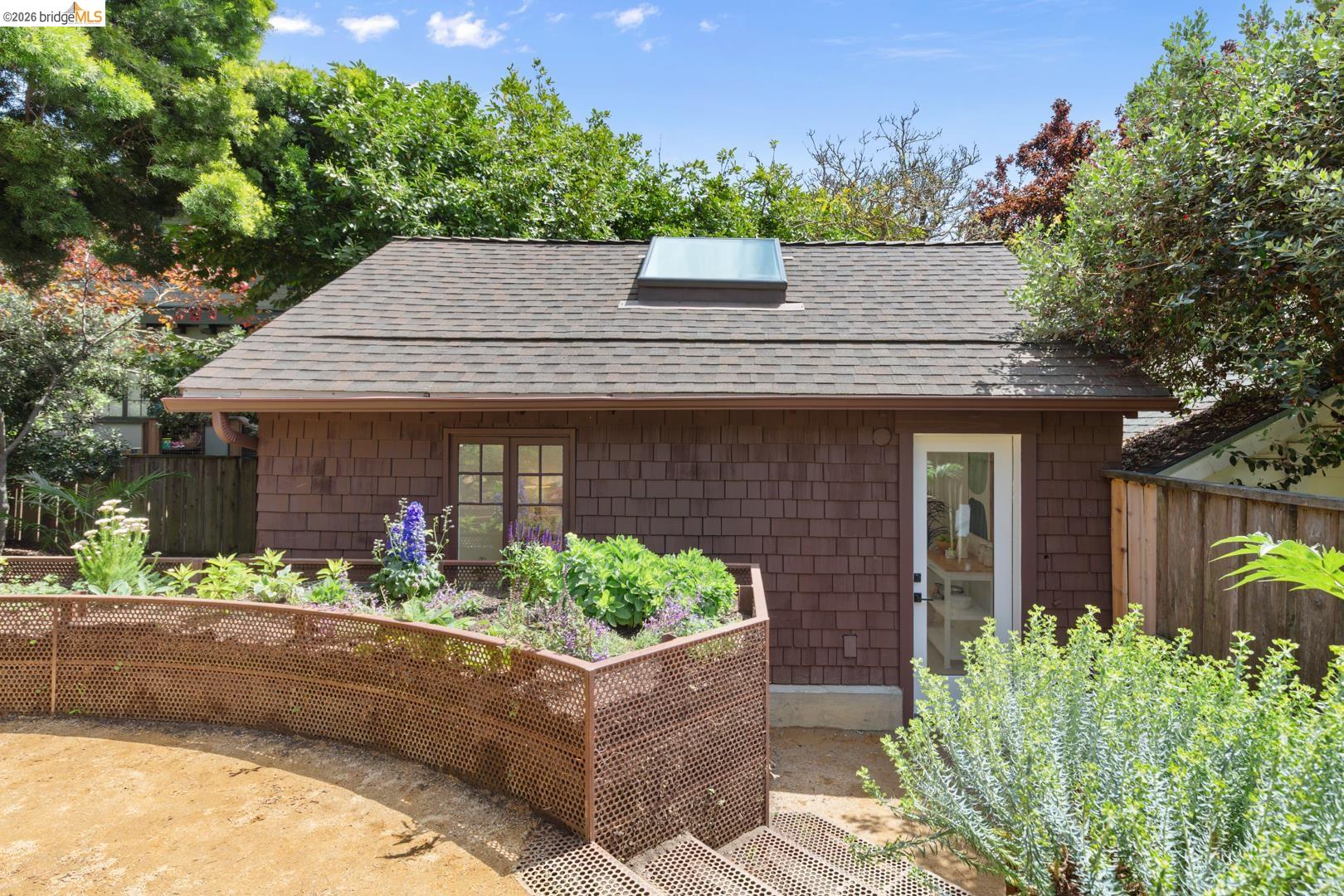 25 Stonewall Road Berkeley, CA 94705 - Photo 44 of 52 Detached structure featuring wood shingle siding and an asphalt shingle roof