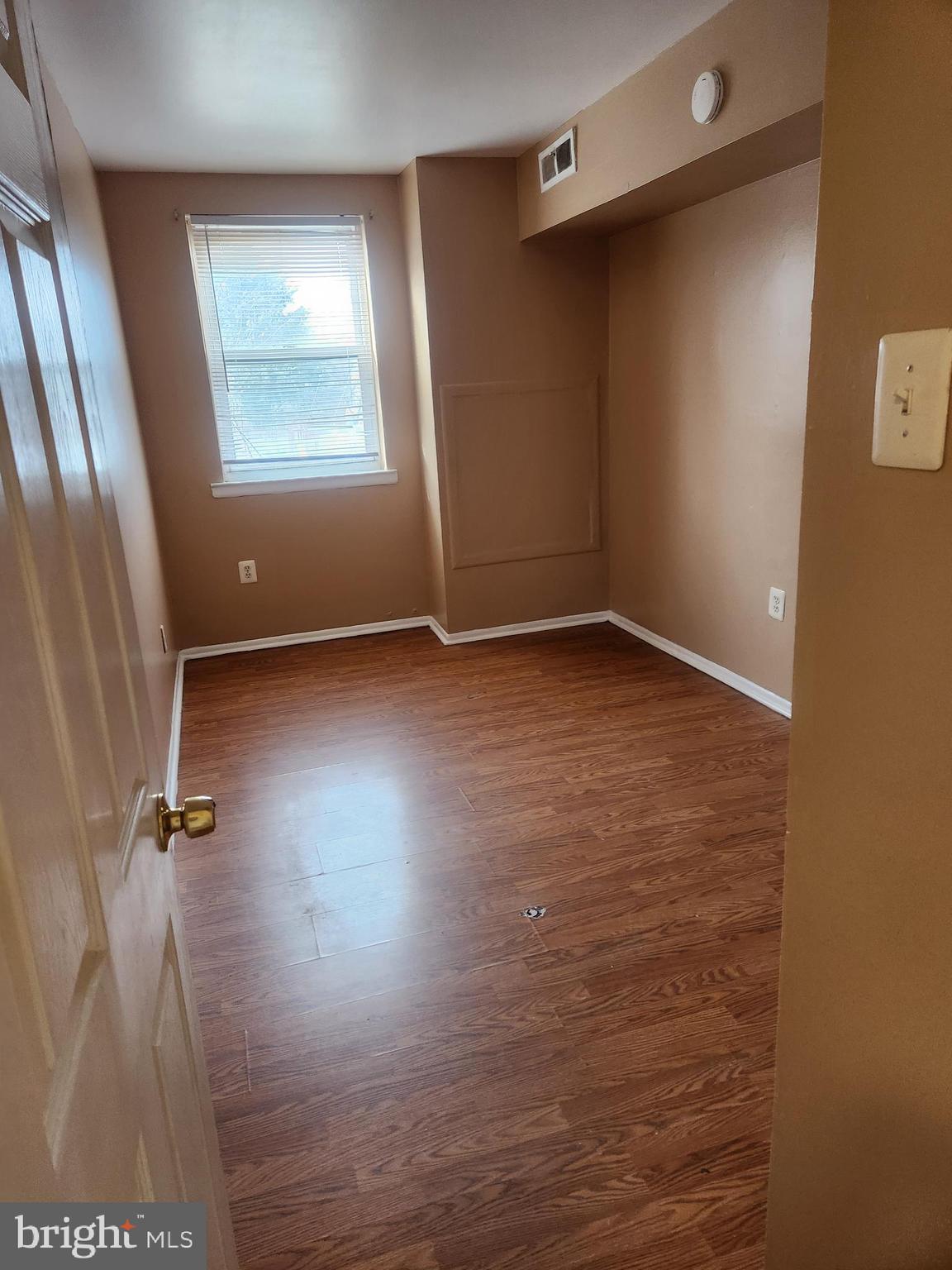 4320 Howell Street, Unit 1 Philadelphia, PA 19135 - Photo 7 of 19 an empty room with windows