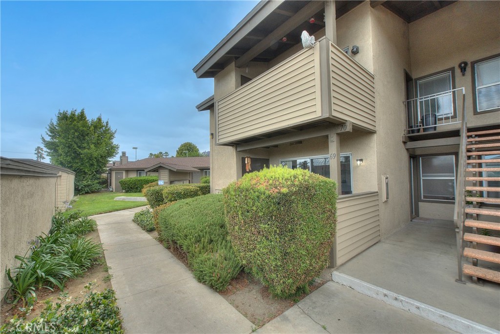 6351 Riverside Drive, Unit 69 Chino, CA 91710 - Photo 20 of 21 a front view of a house with garden
