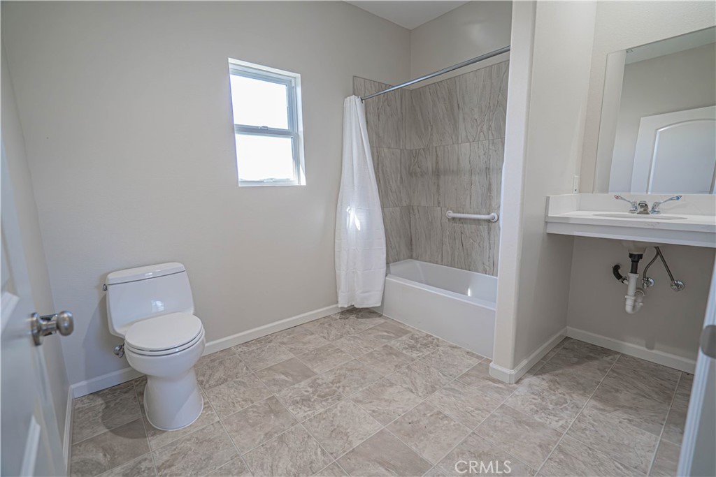10540 Darling Road Agua Dulce, CA 91390 - Photo 19 of 56 a bathroom with a sink toilet and shower