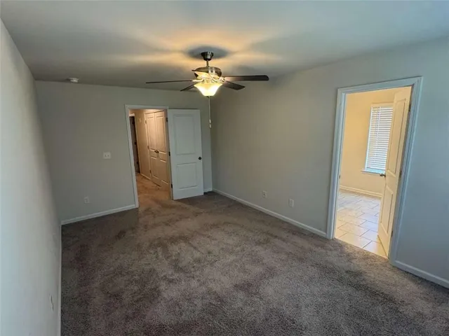a view of a bathroom with a glass door
