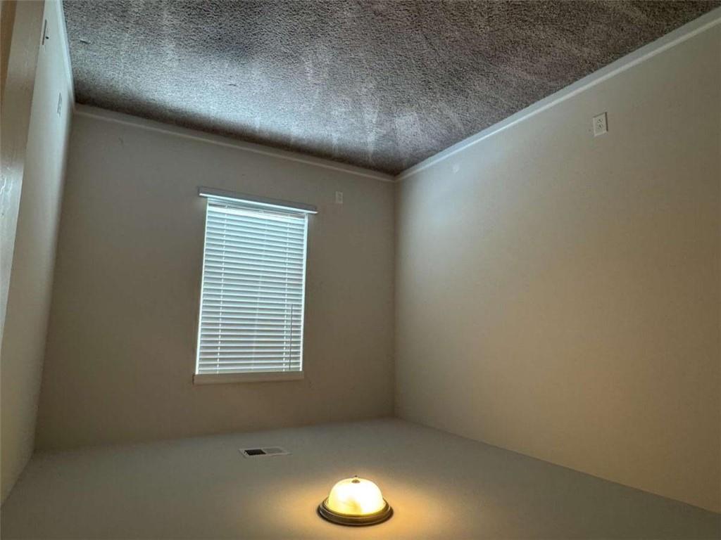 3376 Highbury Way Stonecrest, GA 30038 - Photo 17 of 28 an empty room with a window