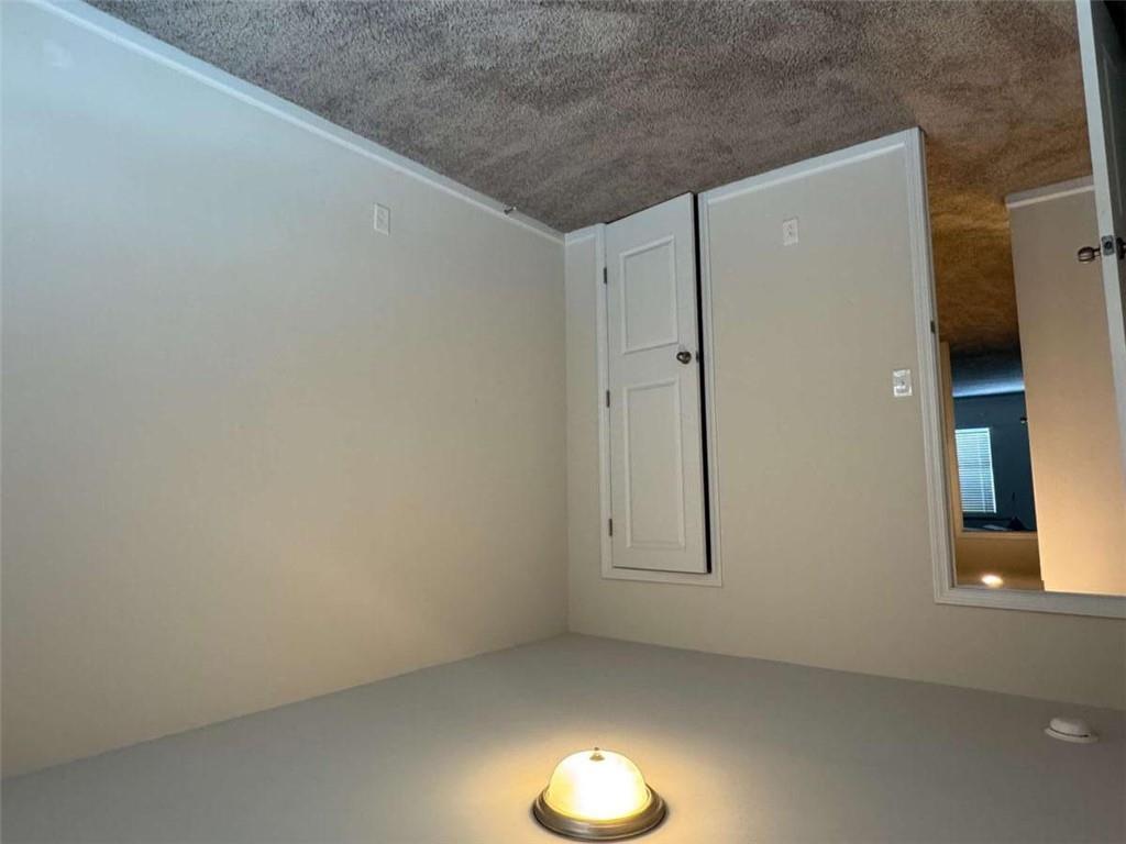 3376 Highbury Way Stonecrest, GA 30038 - Photo 18 of 28 an empty room with closet area