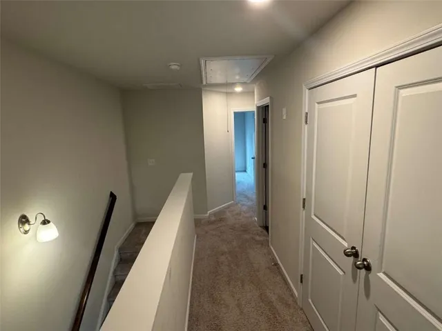 a view of a backyard with a small cabin