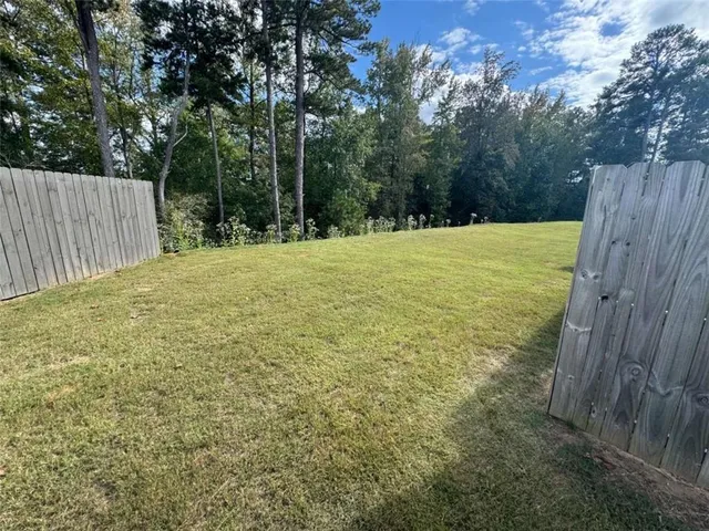 a view of outdoor space and yard