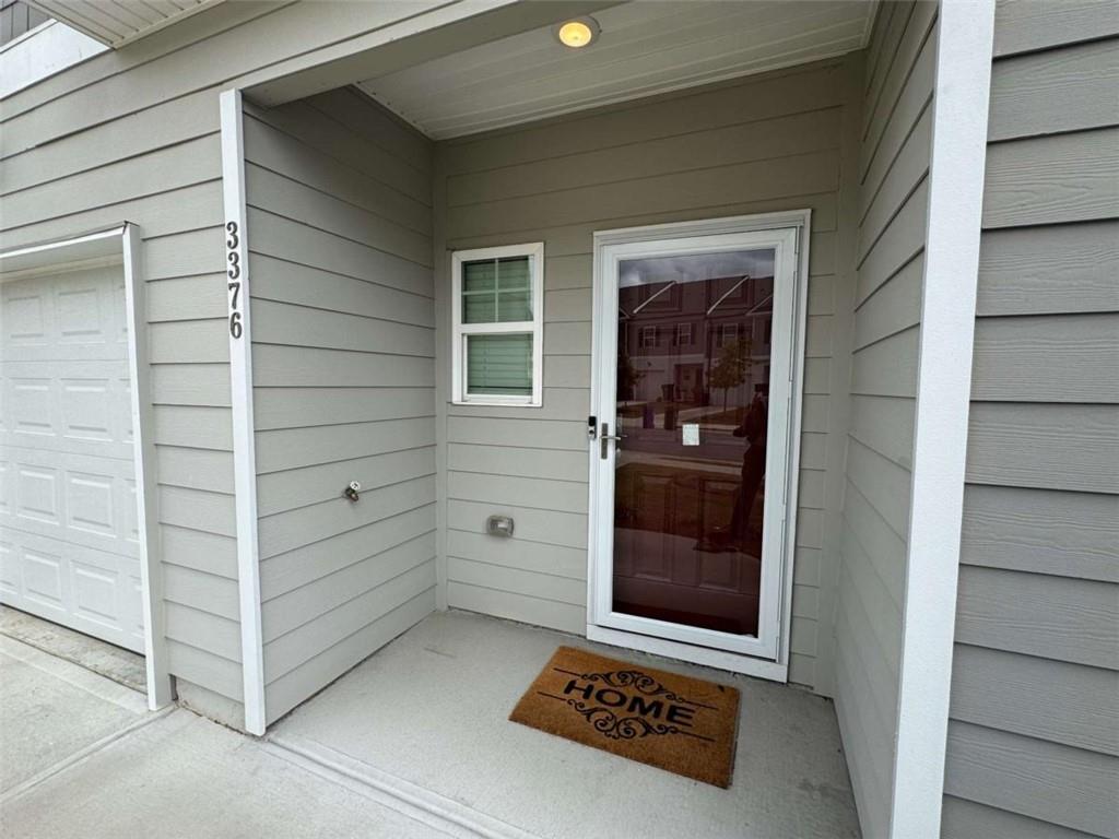 3376 Highbury Way Stonecrest, GA 30038 - Photo 3 of 28 a view of front door of a house