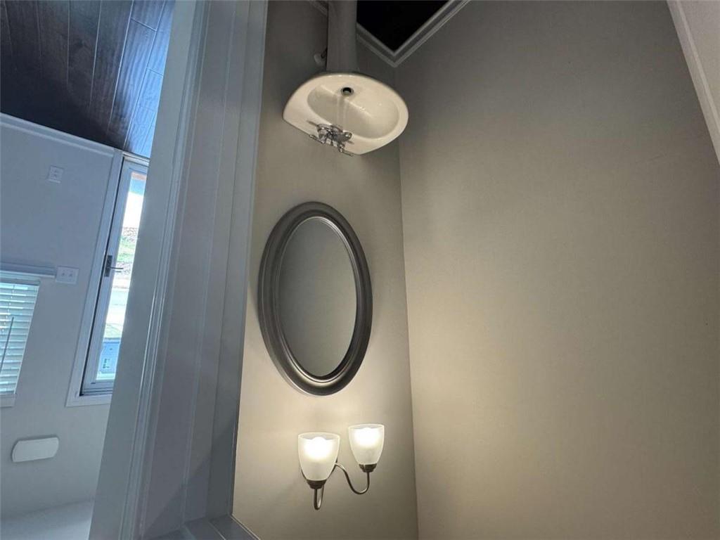 3376 Highbury Way Stonecrest, GA 30038 - Photo 8 of 28 a bathroom with a sink and a mirror