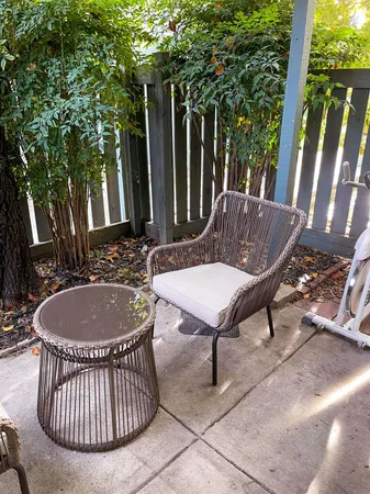 a view of a chairs and tables in the patio