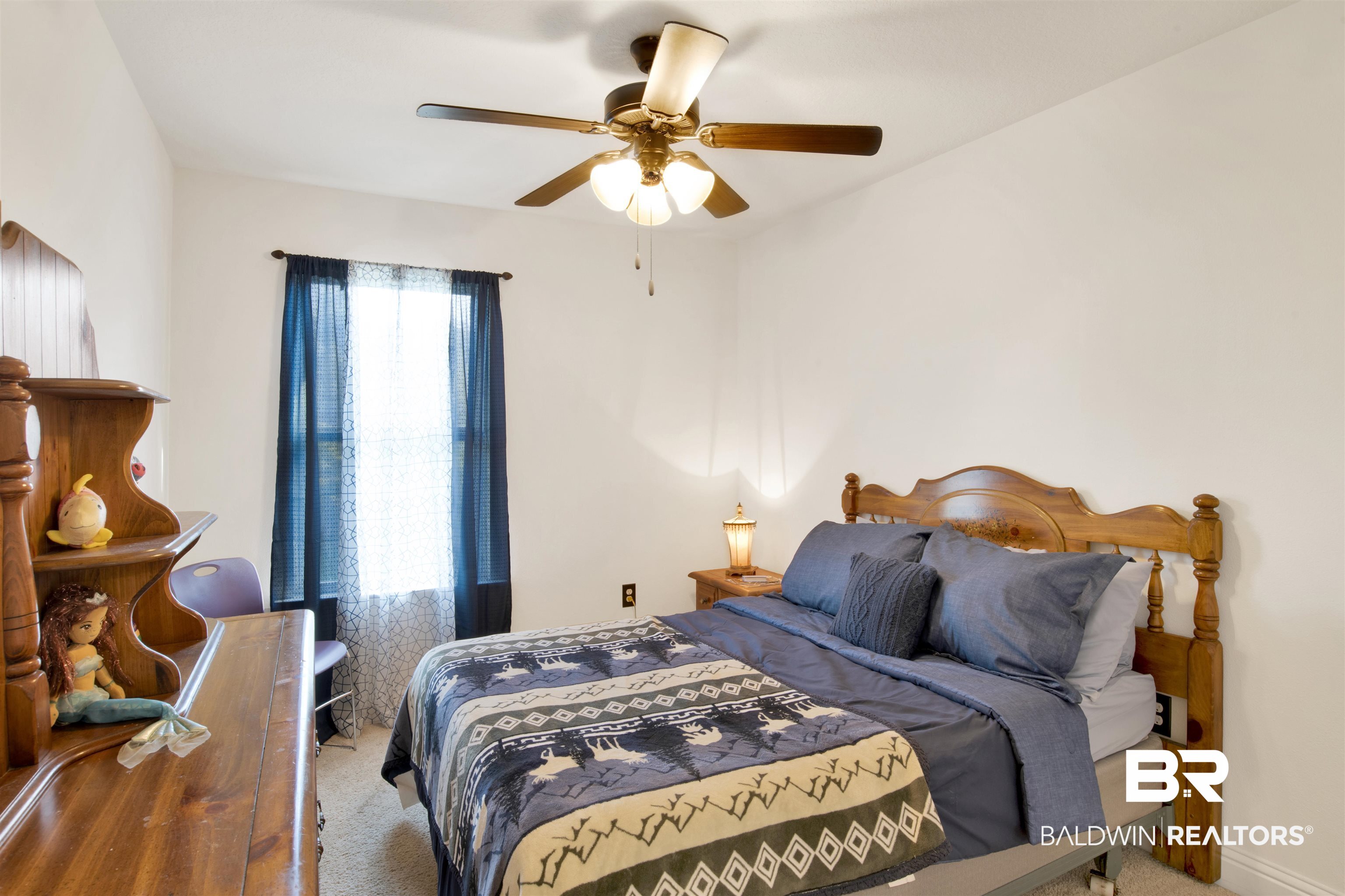 25806 Pollard Road, Unit 80 Daphne, AL 36526 - Photo 3 of 30 Bedroom with carpet flooring and a ceiling fan