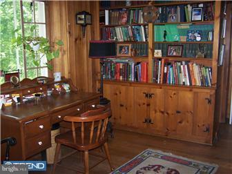 443 Righters Mill Road Narberth, PA 19072 - Photo 7 of 11 a living room with lots of books and furniture