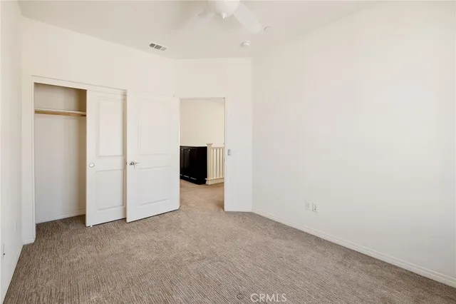 a kitchen with a sink and a wooden cabinets