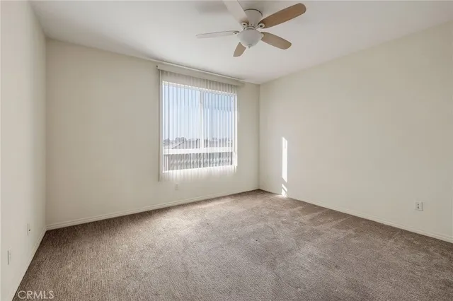 a bathroom with double vanity sinks and a mirror